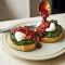 Poached eggs with 'nduja butter and spinach